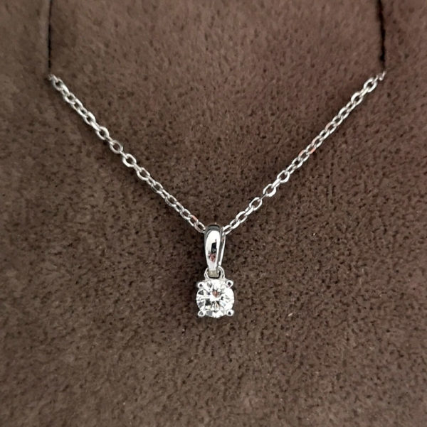 0.13 Carat Diamond Pendant & Chain