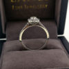 0.76 Round Brilliant Cut Diamond Ring with Diamond Halo and Shoulders