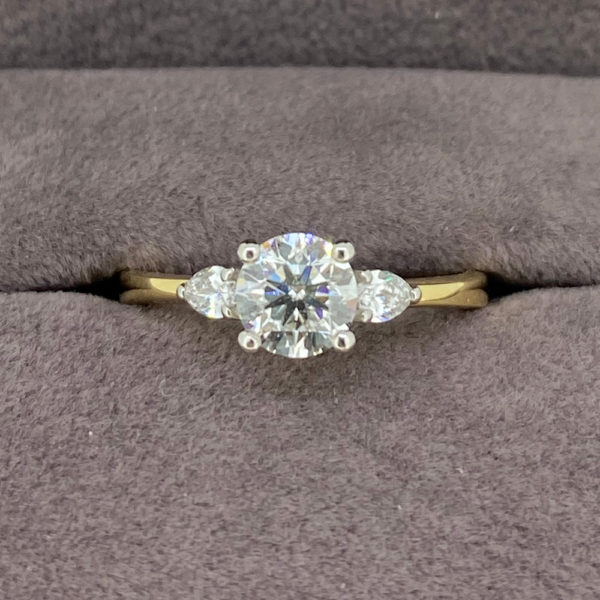 0.91 Carat Round Brilliant Cut Ring with Pear Shaped Shoulders