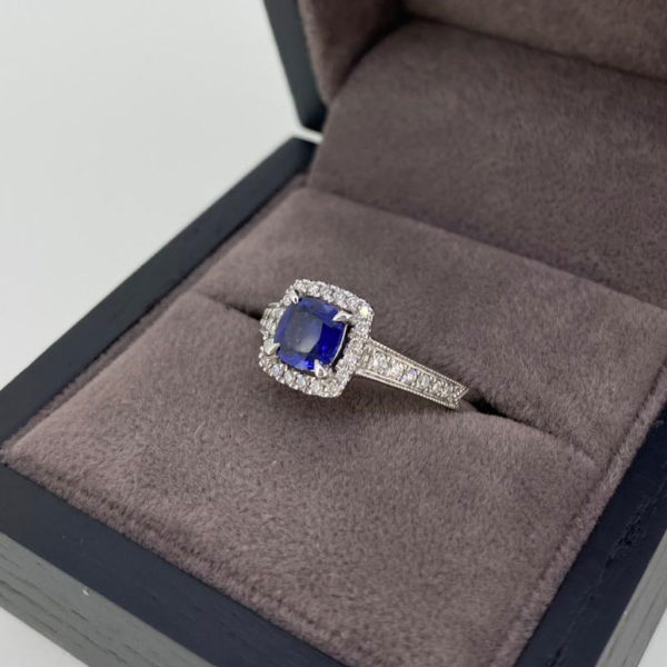 0.80 Carat Diamond & Sapphire Halo Ring in White Gold