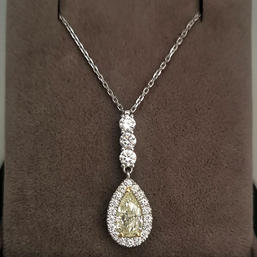1.42 Ctw Pear Shaped Diamond Necklace: Floating V Shape